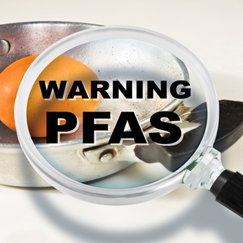 A teflon frying pan showing the PTFE PFAS warning.