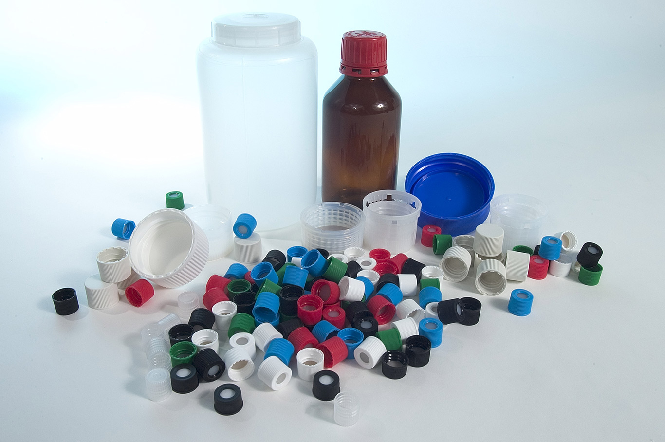 Plastic bottles with assorted bottle caps and closures for laboratory and chemical packaging