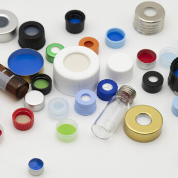 Assorted ILT bottle caps, cap liners, septa, and laboratory vials