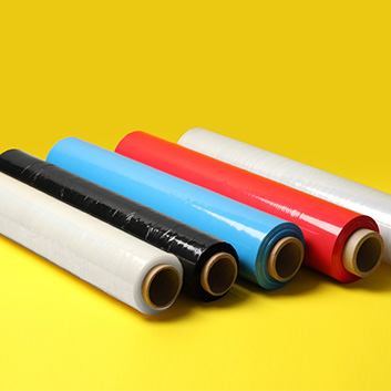 Multicolored spools of fluoropolymers.